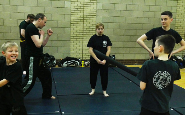 Kick Boxing - Playing the Shin Nai game, testing reflexes with fast attack and blocking techniques.
