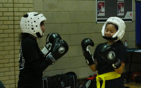 Kung Fu - Light contact sparring to hone skills, timing and accuracy of placement of strikes, whilst covering and fending off strikes